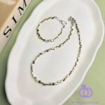 ست گردنبند و پابند فلزی دو رنگ نقره ای طلایی