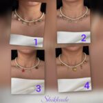 گردنبندگردنبند مرواریدی با آویزهای دریایی شیک و خاص، با قیمت عالی مرواریدی همراه با آویزهای مدل دریایی شیک و خاص، با قیمت عالی